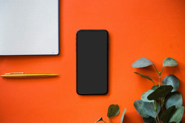 phone on orange table