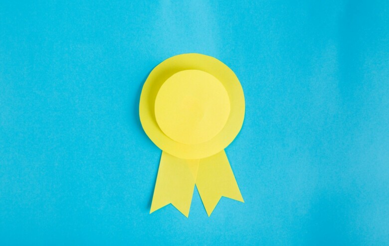 yellow ribbon on a blue background