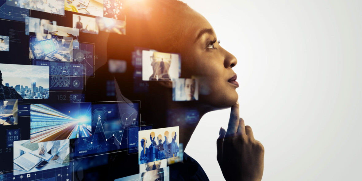 Woman looking to the right with photos of professional things behind her