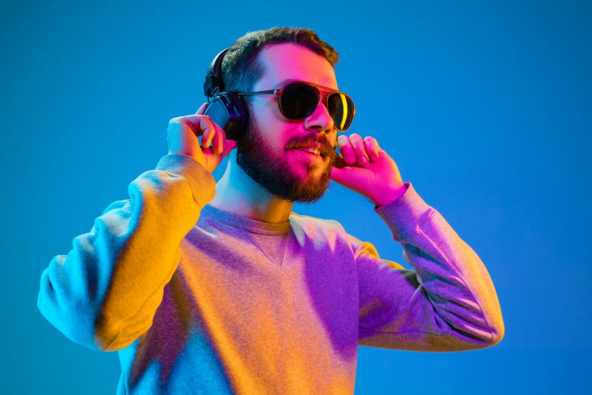 Man listening to music through headphones