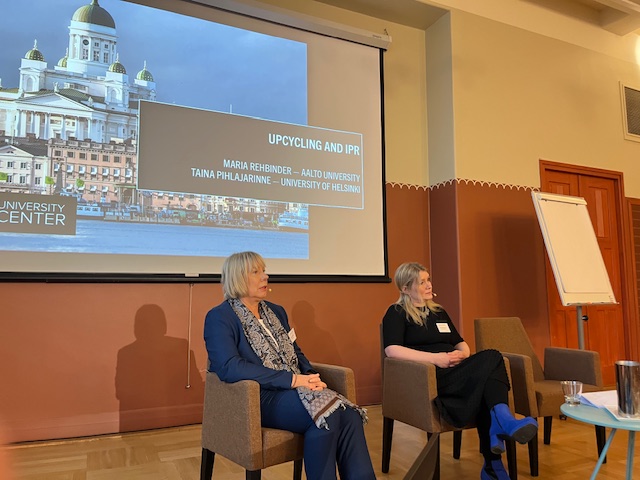 Two women giving a presentation.