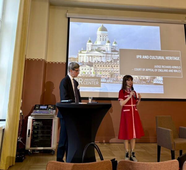 Two persons giving a presentation.