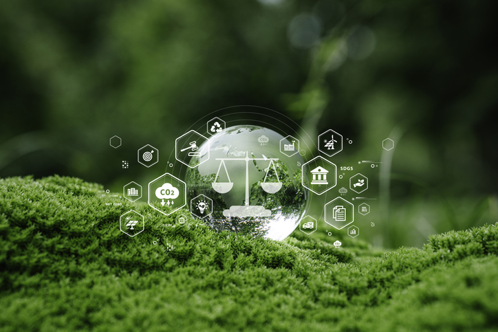 Sustainability environmental law, CO2 reduction. Glass globe on green moss with eco-law icons symbolizing green legal framework and nature protection.